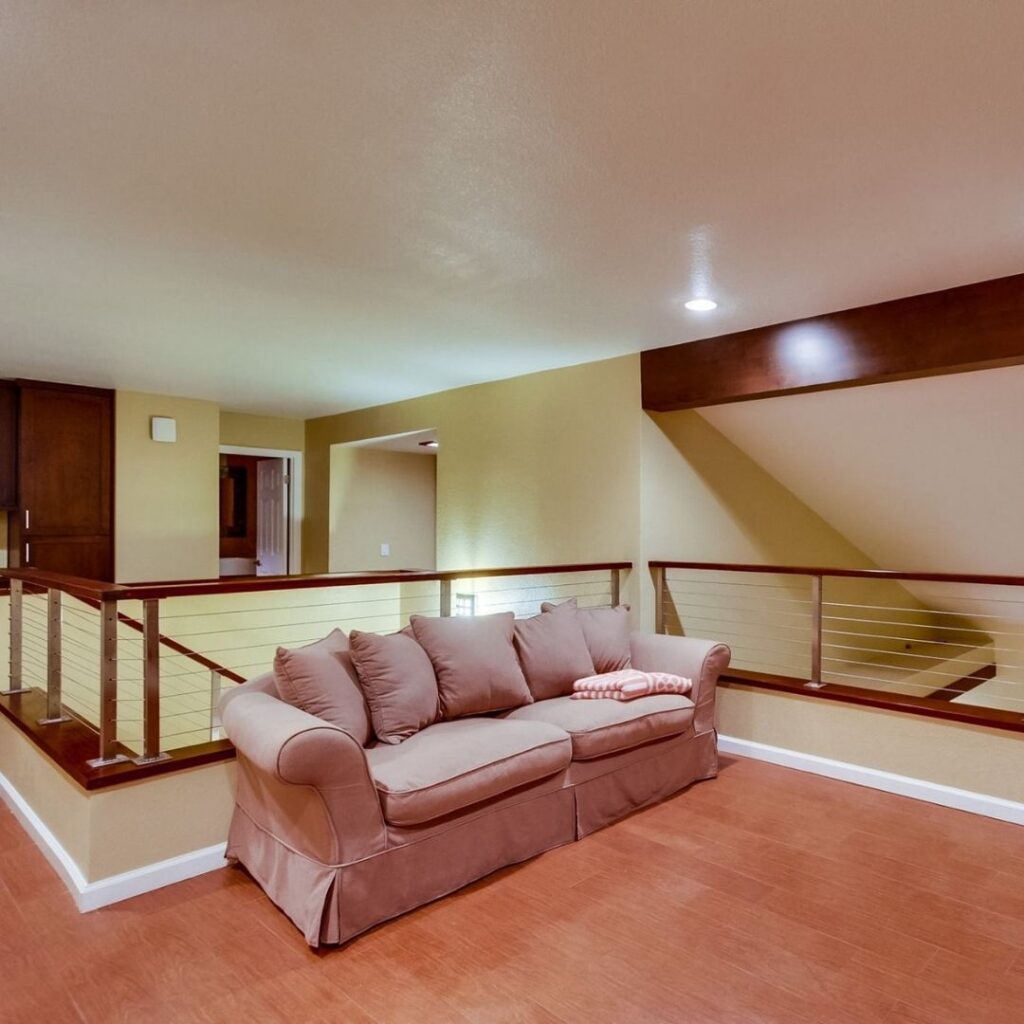 Detailed view of high-quality stainless steel cable railing hardware and tensioners.