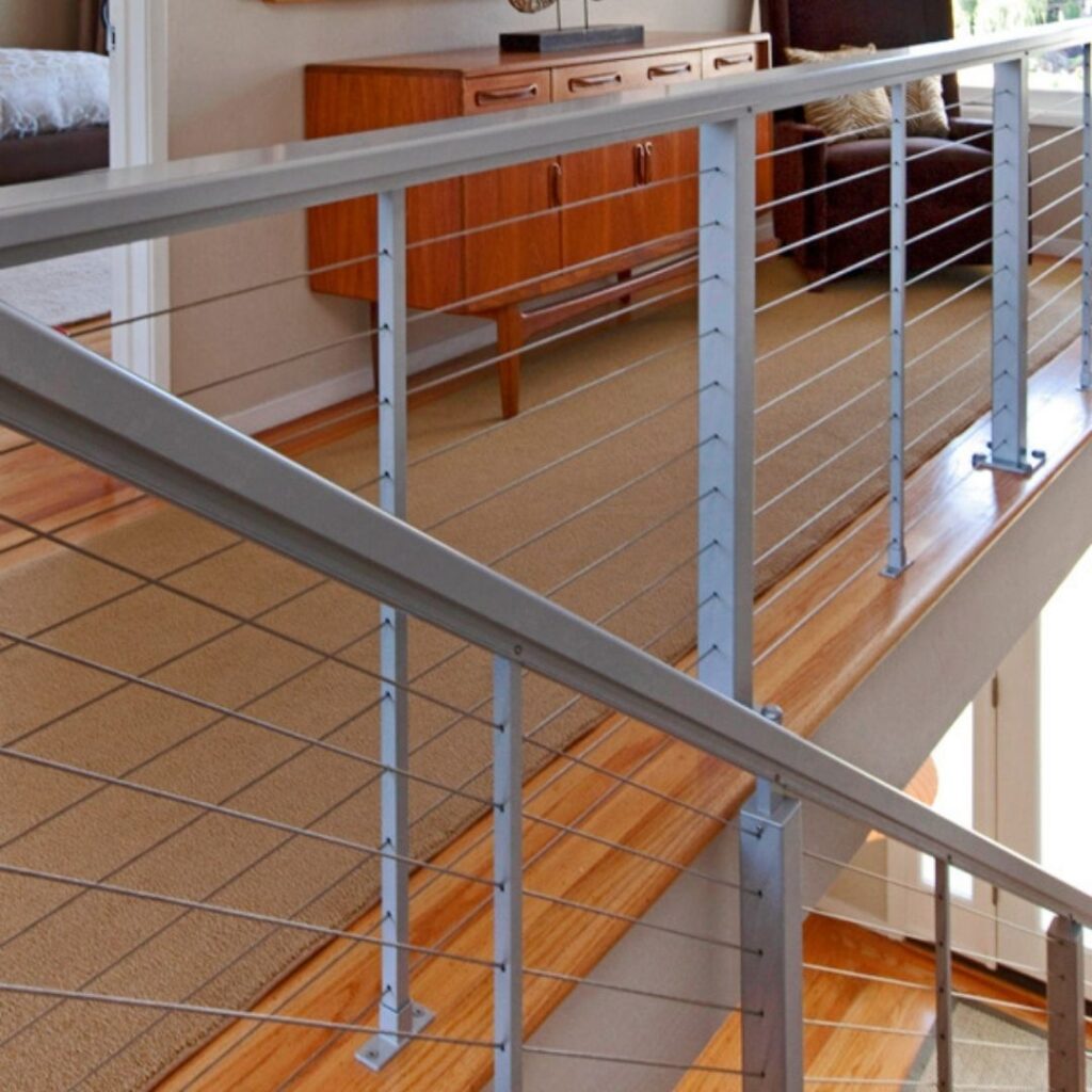 Detail shot of durable stainless steel cable railing tensioner and hardware components.