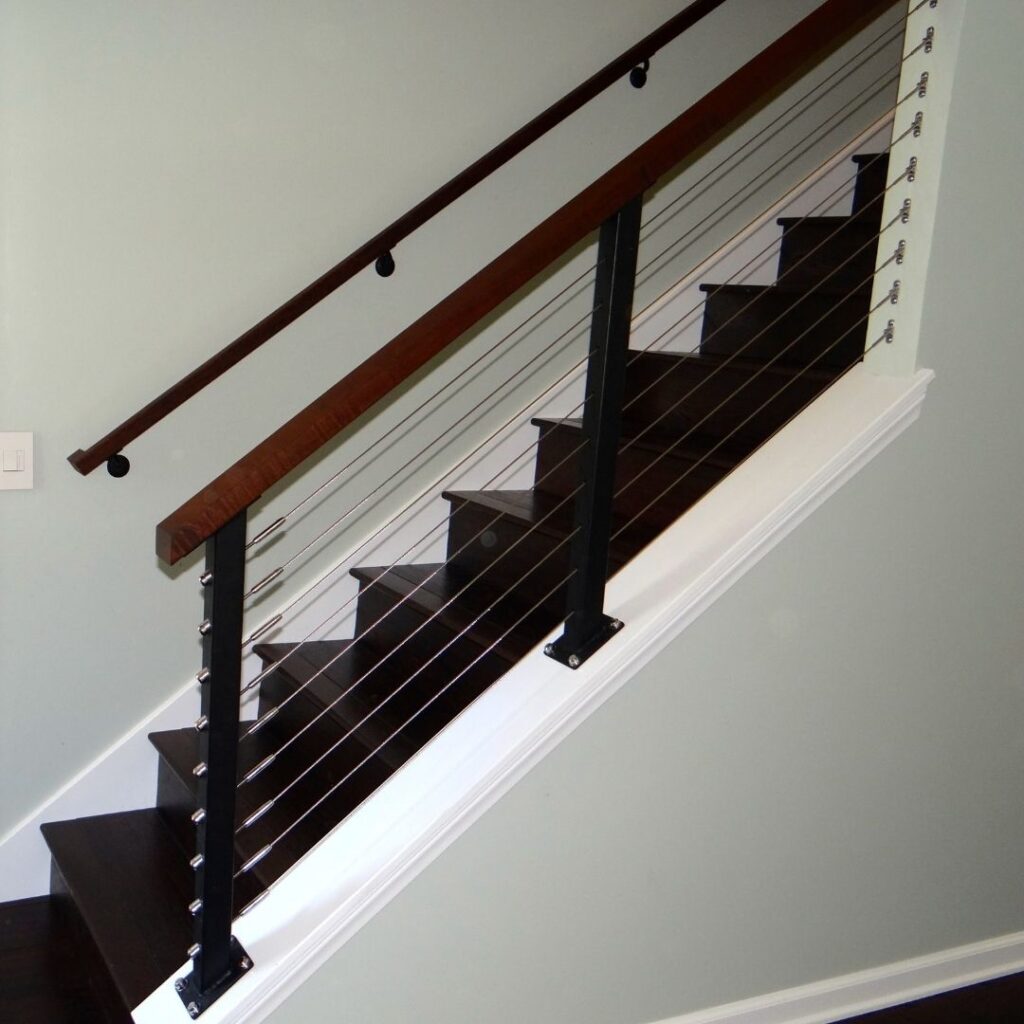 Dark wood interior railing.